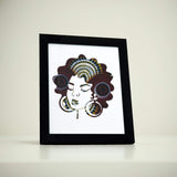 black woman with afro hair and large earrings ecoresponsible poster made of african fabric scap