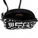 Intérieur d'un sac bandoulière noir et blanc montrant le compartiment principal et la doublure.