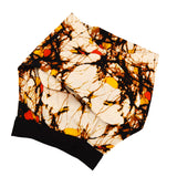 turban style bonnet avec fil métallique beige avec des éclaboussures noires et des touches de jaune et rouge facile à nouer fait main au Québec