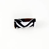 Running headband with removable knot - red