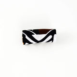 Running headband with removable knot - black