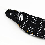 Cowrie African print belt bag - black, white & orange