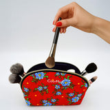 Trousse de maquillage en tissu Chita rouge à fleurs bleues