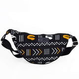 Cowrie African print belt bag - black, white & orange