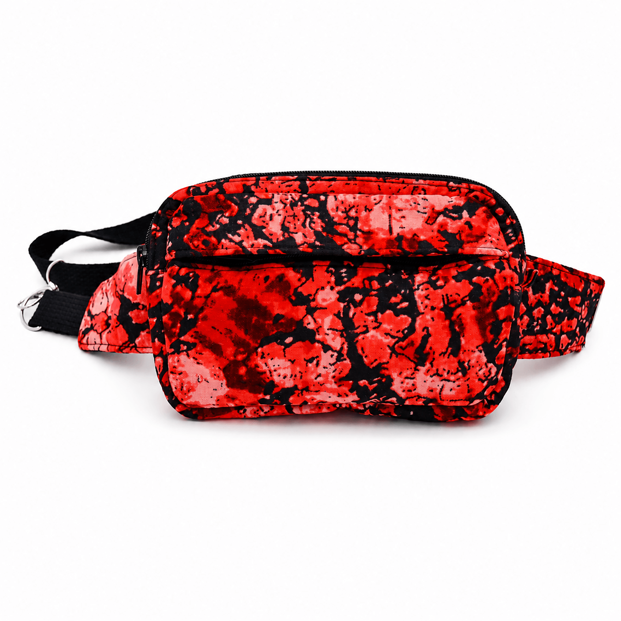 Sac bandoulière convertible rouge et noir fait main à Montréal avec poche avant zippée.