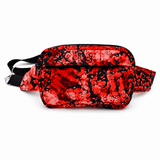 Sac bandoulière convertible rouge et noir fait main à Montréal avec poche avant zippée.
