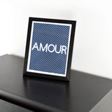 Navy blue shweshwe poster with the text Amour