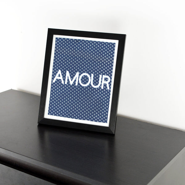 Navy blue shweshwe poster with the text Amour
