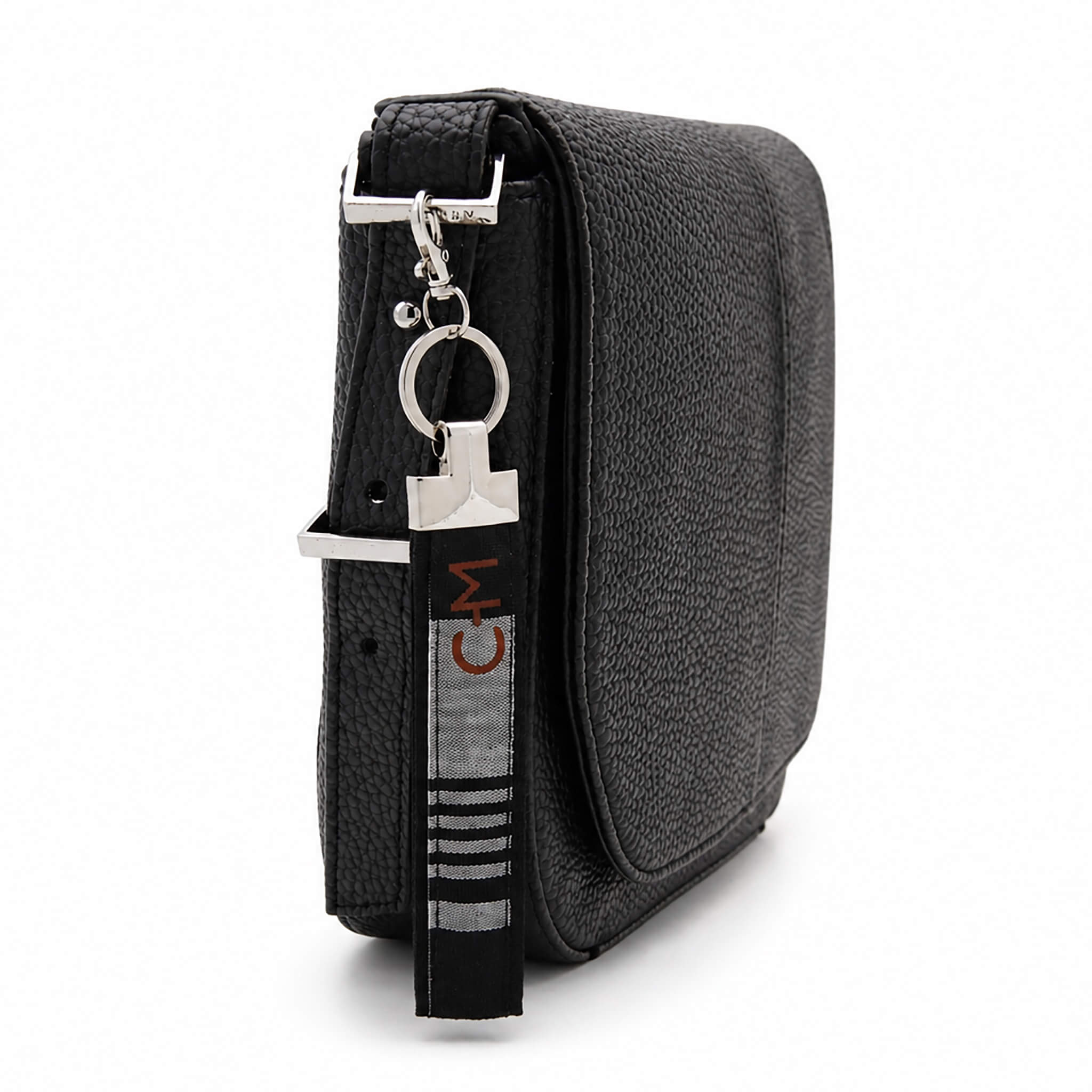 Porte-clé en tissu Coo-Mon attaché à un sac noir, usage polyvalent, Québec