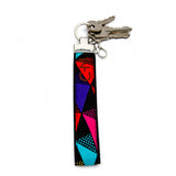 Porte-clé en tissu multicolore avec motifs rouge, mauve, bleu, rose et noir, utilisé avec des clés, Québec Coo-Mon
