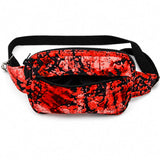 Intérieur du sac bandoulière rouge et noir avec compartiment principal zippé.
